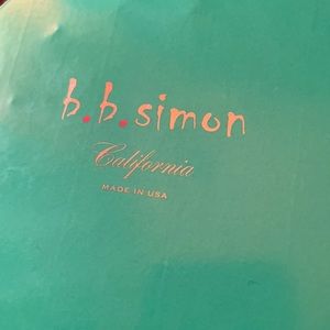 B. B. Simon Belt